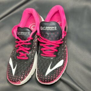 Women’s pink and gray Brooks